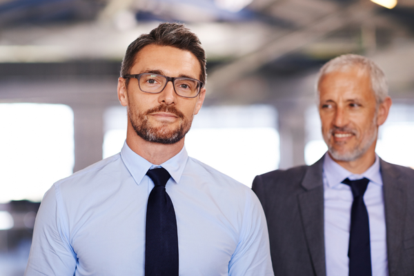 two corporate leaders, one younger one older